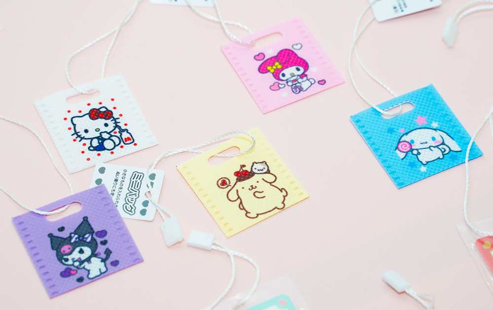 Hello Kitty and other Sanrio characters featured in a bag-shaped collection